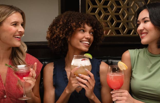 Group of guests enjoying Maggiano's cocktail offerings